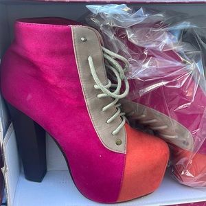 Never worn. Size 6, inside platform boots.